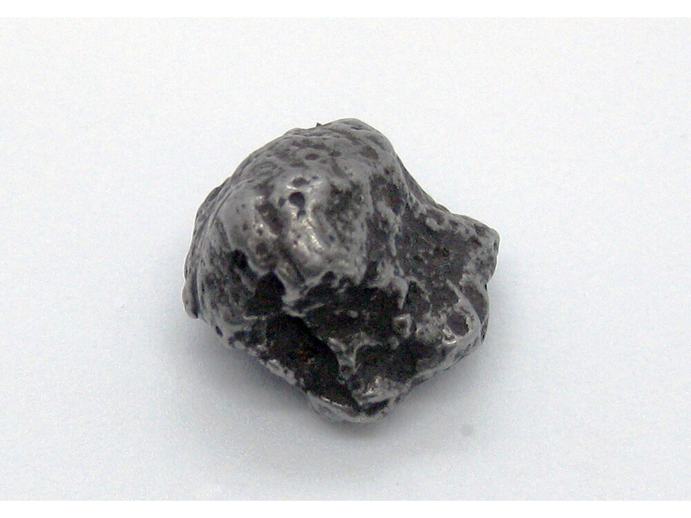 Метеориты каменные хондриты. Лонсдейлит метеоритный камень. Шерготтиты базальты. Метеорит хондрит. Каменный метеорит 7 букв сканворд.